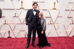Oscar® nominee Bradley Cooper and guest arrive on the red carpet of the 94th Oscars® at the Dolby Theatre at Ovation Hollywood in Los Angeles, CA, on Sunday, March 27, 2022.