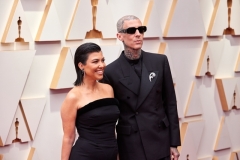 Kourtney Kardashian and Travis Barker arrive on the red carpet of the 94th Oscars® at the Dolby Theatre at Ovation Hollywood in Los Angeles, CA, on Sunday, March 27, 2022.