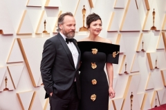 Oscar® nominee Maggie Gyllenhaal (right) and Peter Sarsgaard arrive on the red carpet of the 94th Oscars® at the Dolby Theatre at Ovation Hollywood in Los Angeles, CA, on Sunday, March 27, 2022.