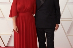 94th Oscars® nominee Roger Frappier arrives with guest on the red carpet of the 94th Oscars® at the Dolby Theatre at Ovation Hollywood in Los Angeles, CA, on Sunday, March 27, 2022.